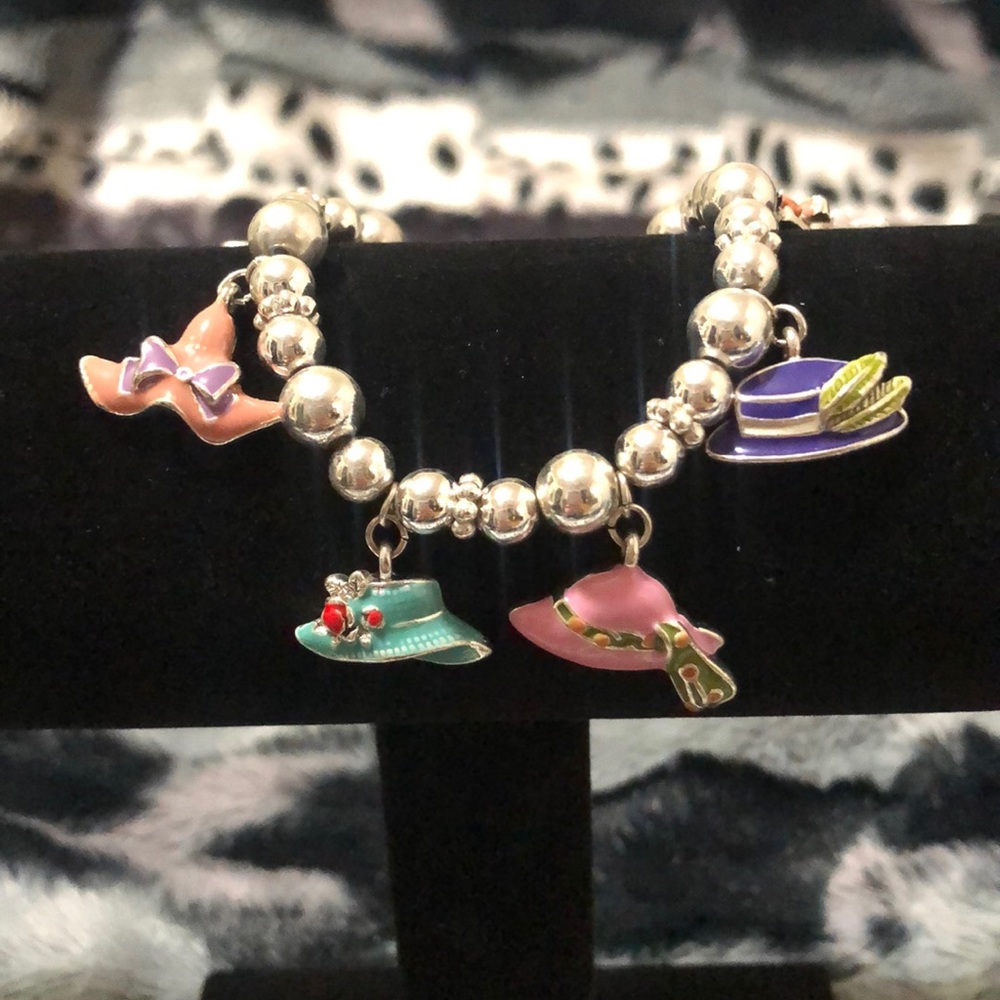 Fun silver bead bracelet with hat charms